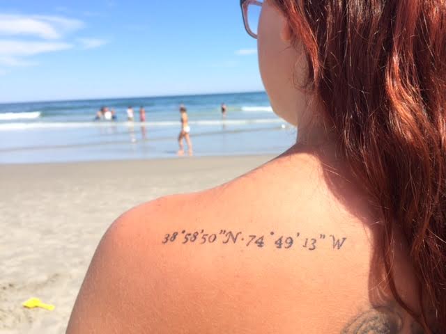 Wildwood Crest Nautical Directions Tattooed on her back. | The